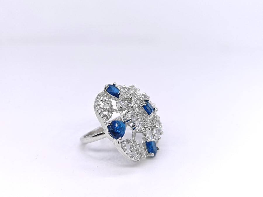Blue floral adjustable ring with silver-plated finish and sparkling crystal accents for women.