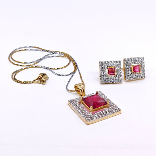 Jewelry set with pendant and earrings on a white background