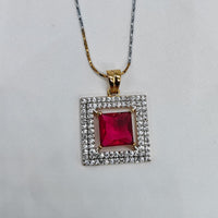 Necklace with a square pendant featuring a red gemstone and diamond accents on a light gray background.