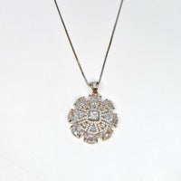 Diamond pendant necklace on a white background