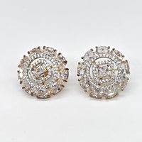 Pair of diamond earrings on a white background