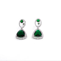 Pair of green gemstone earrings on a white background