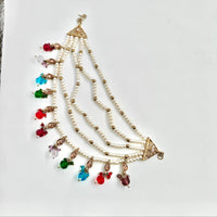 Multistrand necklace with pearls and colorful beads on a white background