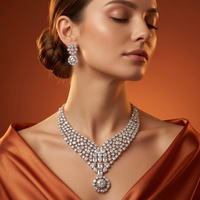 Woman wearing a luxurious diamond necklace and earrings against an orange background