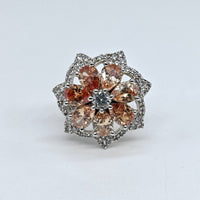 Silver-plated champagne blossom adjustable ring with floral crystal design and sparkling stone accents for women