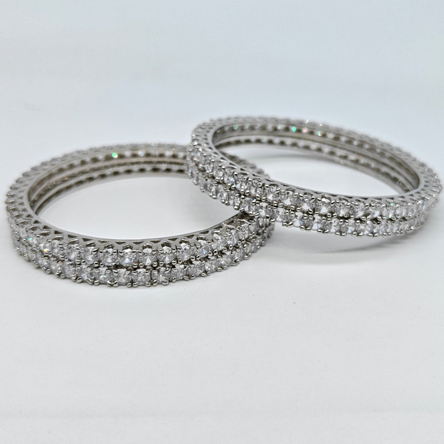 Silver-plated American diamond bangle set with multiple rows of sparkling crystal stones for women