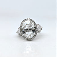 Silver-plated crystal majesty adjustable ring with oversized clear center stone and sparkling American diamond accents for women