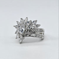 Diamond ring on a light gray background