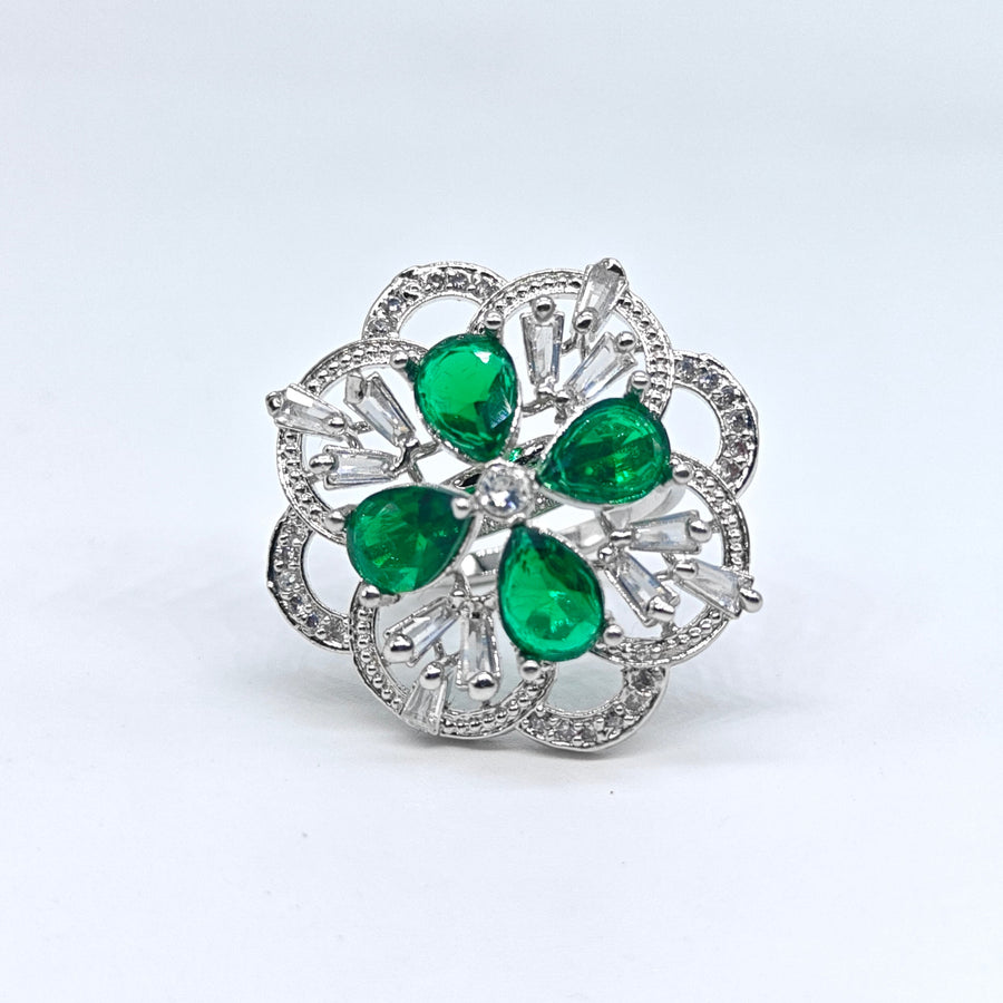 Silver-plated emerald petal bloom adjustable ring with green pear-cut stones and sparkling American diamond accents for women