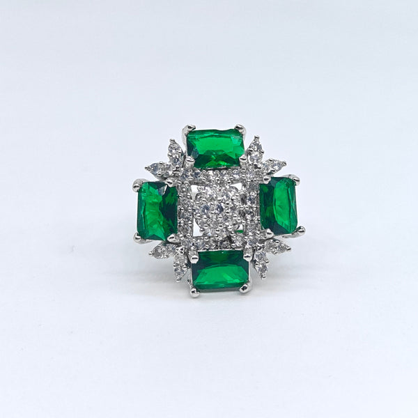 Silver-plated emerald royale frame ring with emerald-cut green stones and sparkling American diamond accents for women