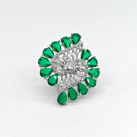 Silver-plated emerald swirl adjustable ring with green pear-cut stones and sparkling American diamond accents for women