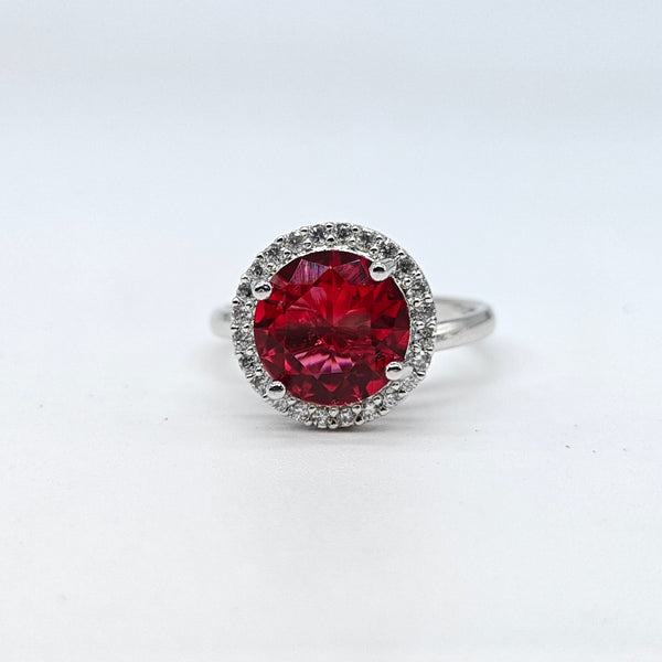 Silver-plated ruby halo adjustable ring with red round center stone and sparkling American diamond accents for women