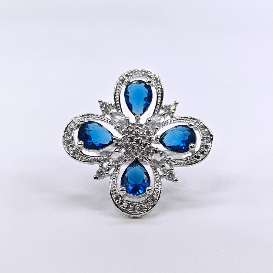 Silver-plated sapphire clover adjustable ring with blue pear-cut stones and sparkling American diamond accents for women