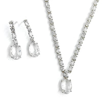 Jewelry set with necklace and earrings on a white background